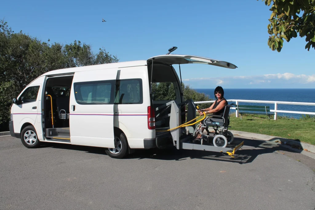 person in wheelchair using wheelaway van