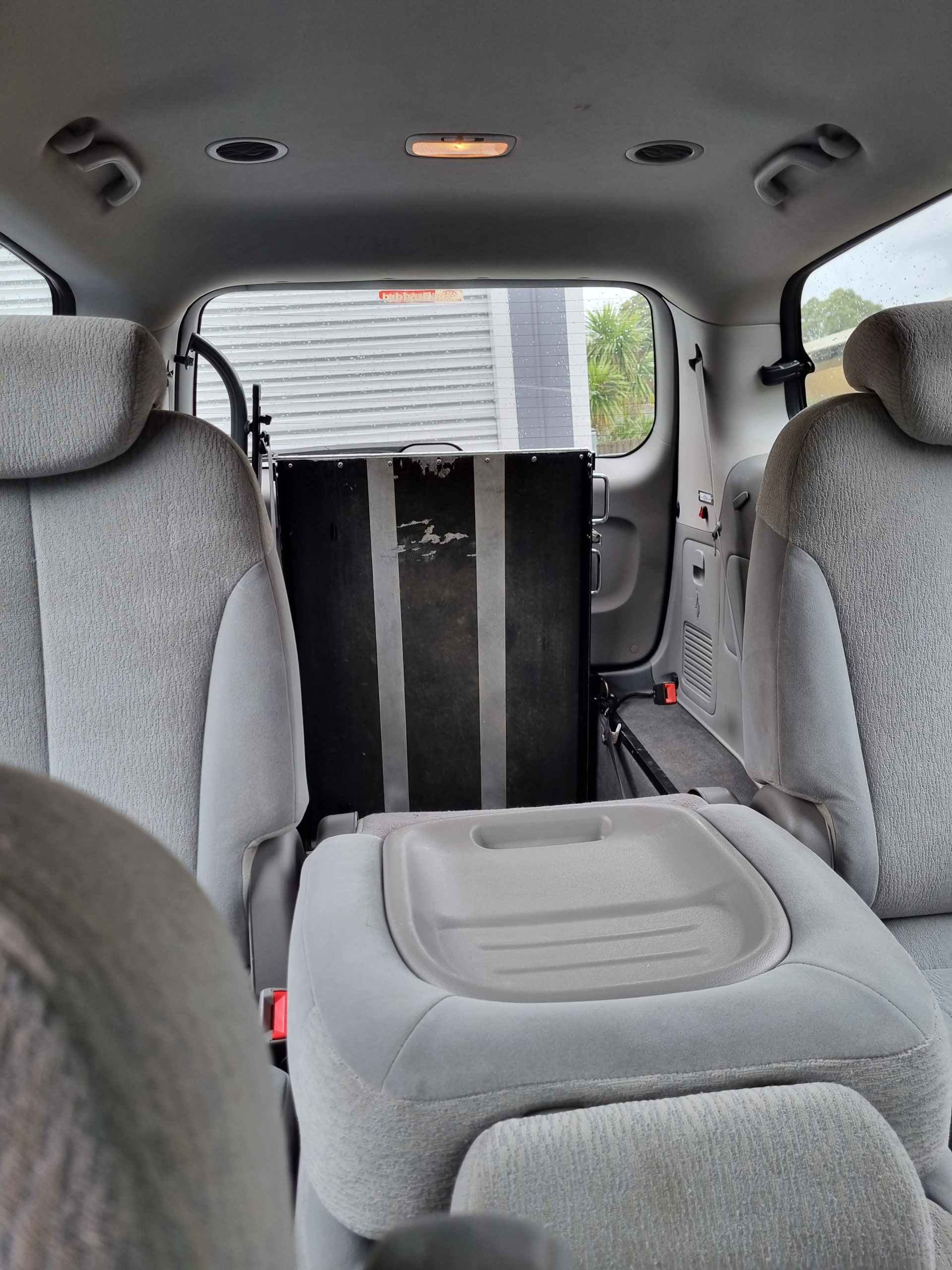 3rd row Kia Carnival wheelchair accessible vehicle photo 7