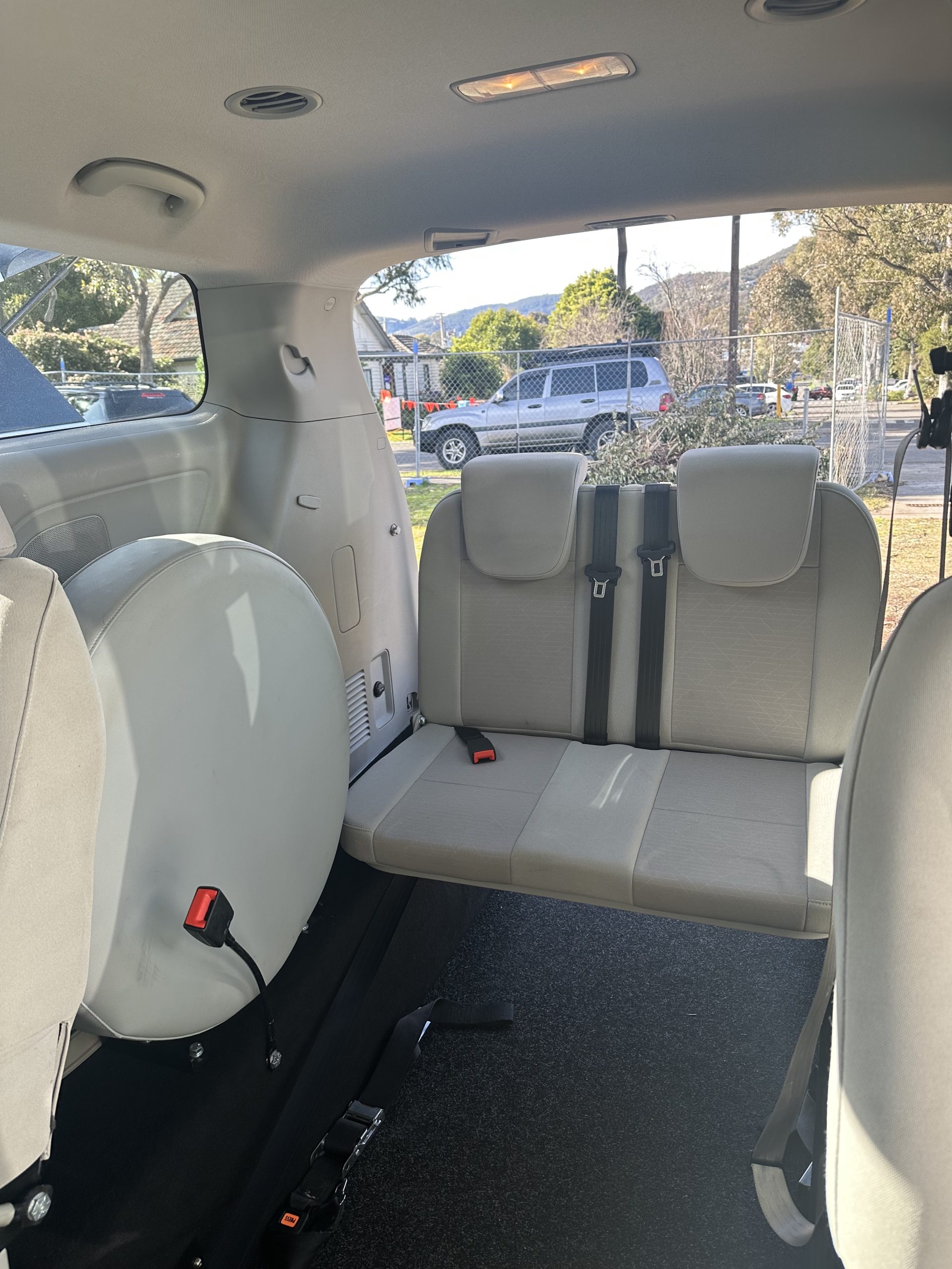 2nd row Kia Carnival wheelchair accessible vehicle photo 6